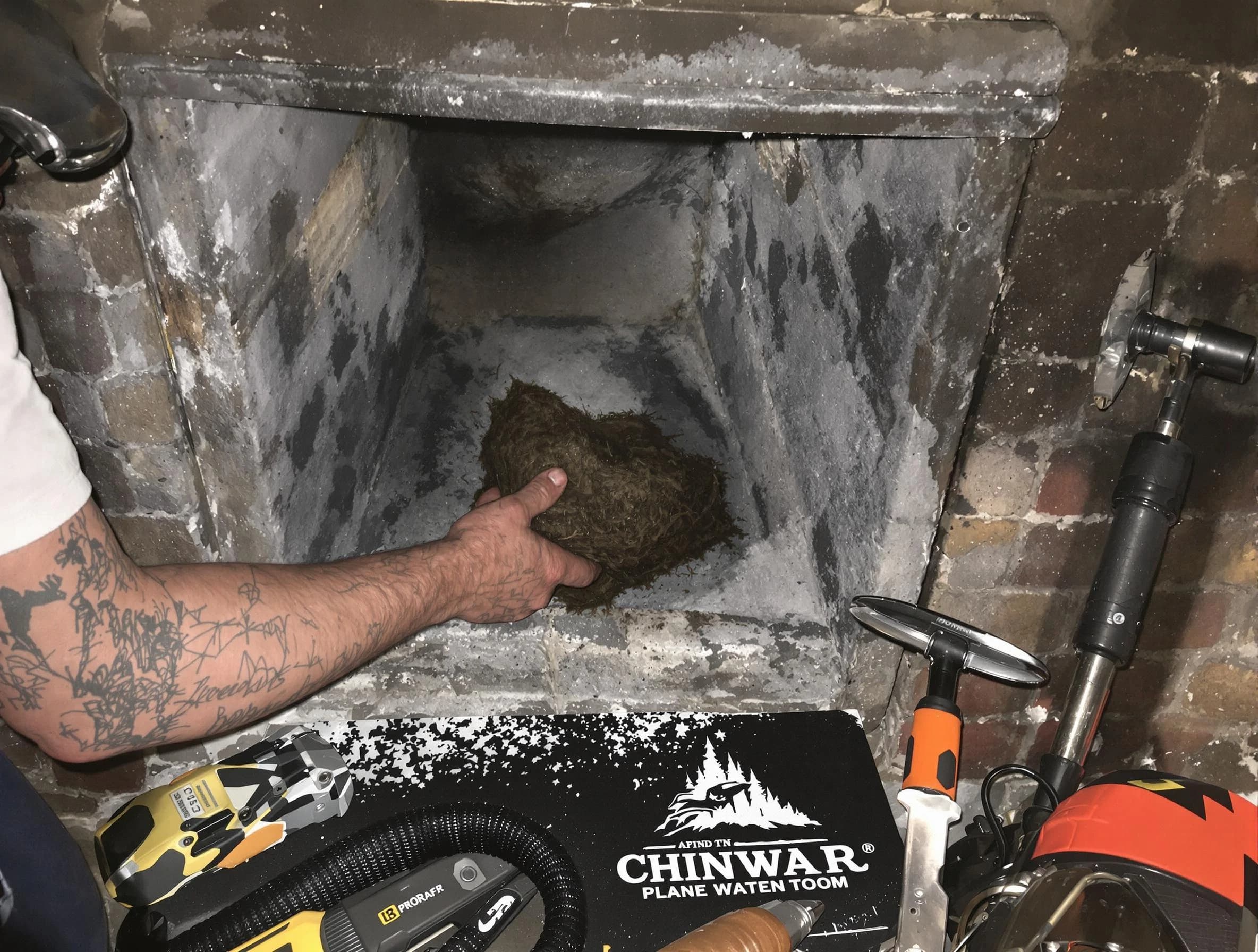 Harrison Chimney Sweep safely removing debris and screening chimney in Harrison, PA
