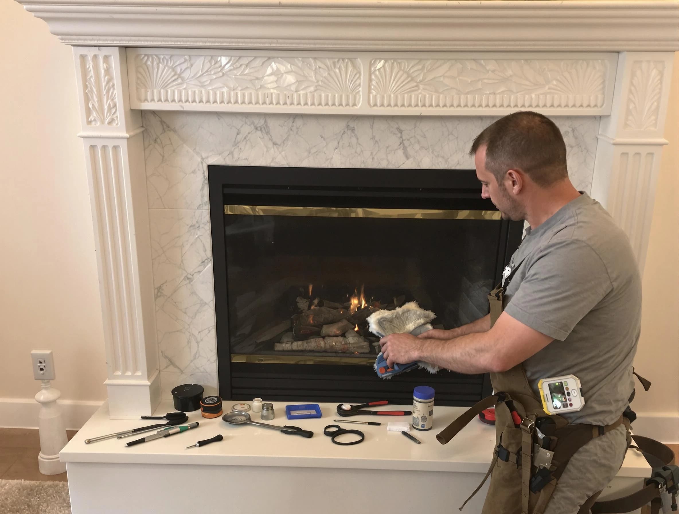 Harrison Chimney Sweep performing fireplace maintenance in Harrison, PA